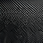 A close-up shot of woven carbon fiber material, showcasing its texture and pattern. Professional studio lighting, high detail, safe for work, appropriate content, fully clothed (material is inanimate), professional.